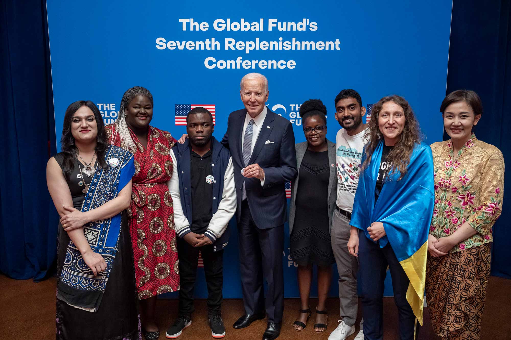 <p>U.S. President Joe Biden with community advocates at the Global Fund’s Seventh Replenishment Pledging Conference in New York City on September 21, 2022. From left to right: Moon Ali, Krystal Birungi, Patrick Alain Fouda, Loyce Maturu, Niluka Perera, Valeriia Rachynska, and Meirinda Sebayang.<em> Official White House Photo by Adam Schultz</em></p>