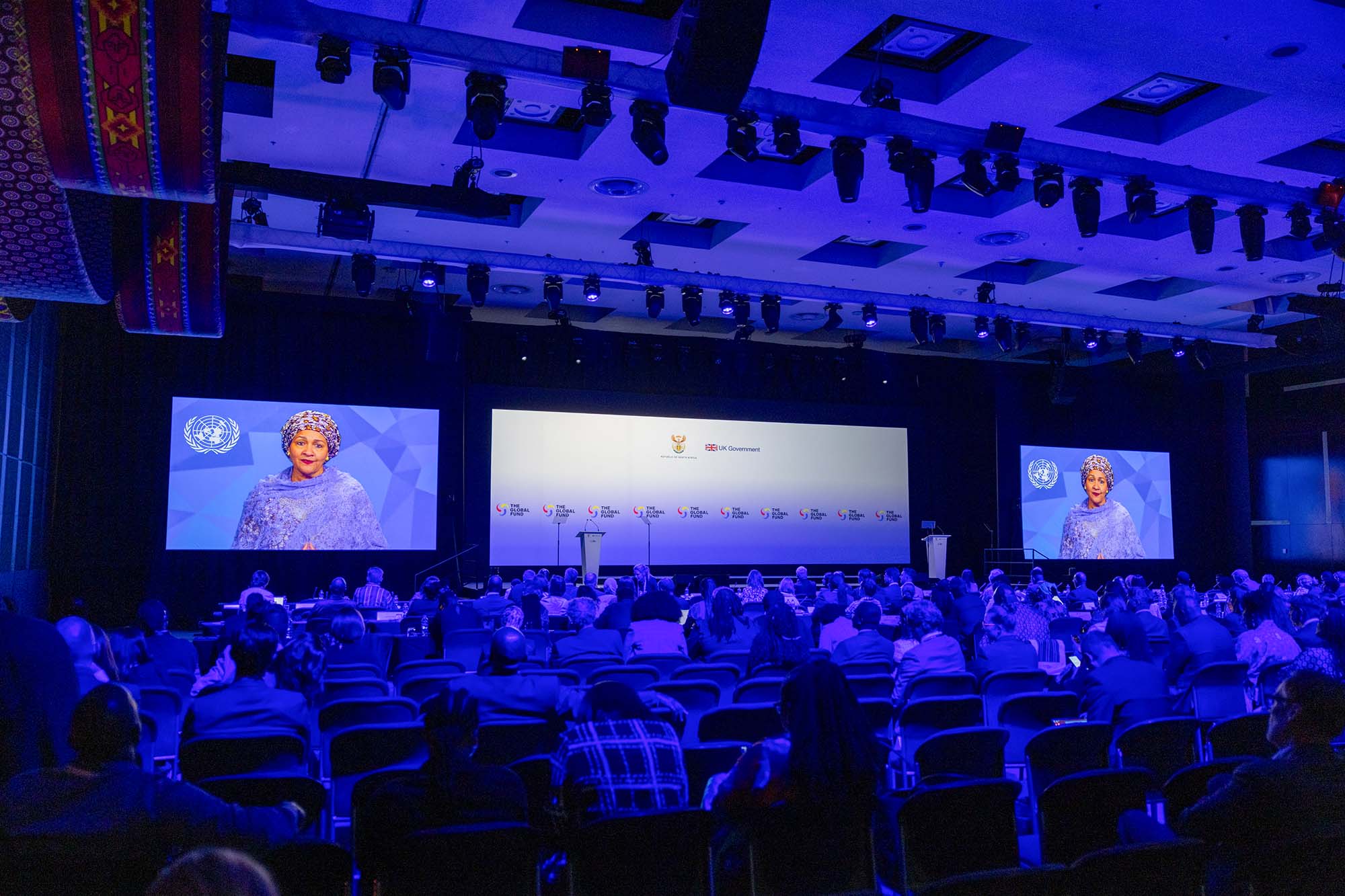 Amina J. Mohammed, Deputy Secretary-General of the United Nations, delivers a video message to the audience at the Global Fund’s Eighth Replenishment Summit in Johannesburg, South Africa, on 21 November 2025.