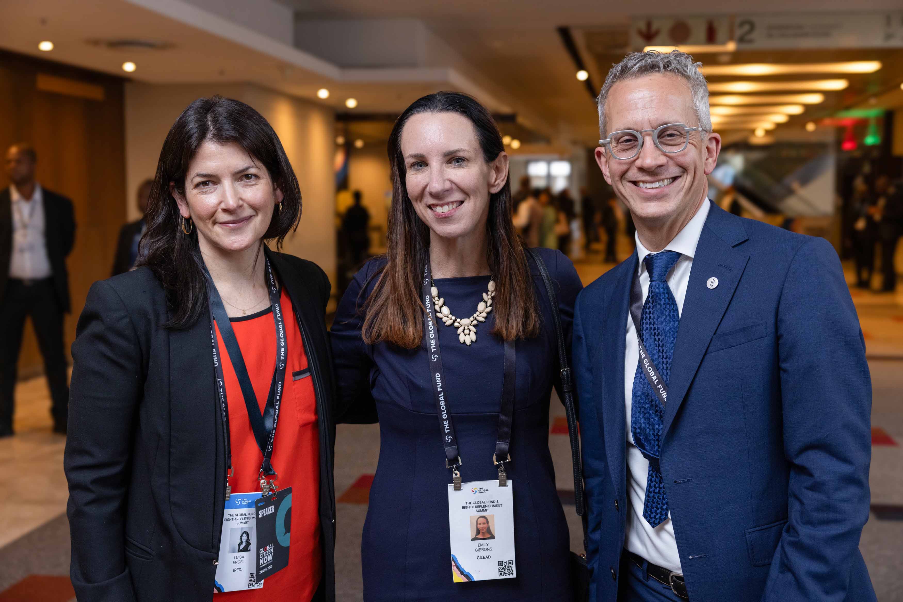 From left to right: Luisa Engel, Chief Strategy and Impact Officer at (RED); Emily Gibbons, Senior Director, International Government Affairs &amp; Policy, Gilead Sciences; and Dr. Jared Baeten, Senior Vice President, Clinical Development Virology Therapeutic Area Head, Gilead Sciences at the Global Fund’s Eighth Replenishment Summit in Johannesburg, South Africa, on 21 November 2025.